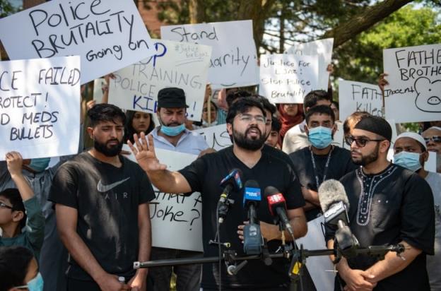 Hashim Choudhary addresses the media in front of the apartment building wher<em></em>e his uncle, Ejaz Choudry, a 62-year-old man who family members said was experiencing a schizophrenic episode, was shot by Peel Police and died at the scene the previous night, in Mississauga, Ont., Sunday, June 21, 2020. 